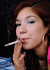 Leah Cortez cigarette in bed